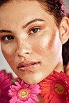 Beauty portrait, woman and flowers for skincare dermatology, makeup and cosmetics. Facial, wellness and self care for skin glow, daisy product and face freckles of a healthy model for floral headshot