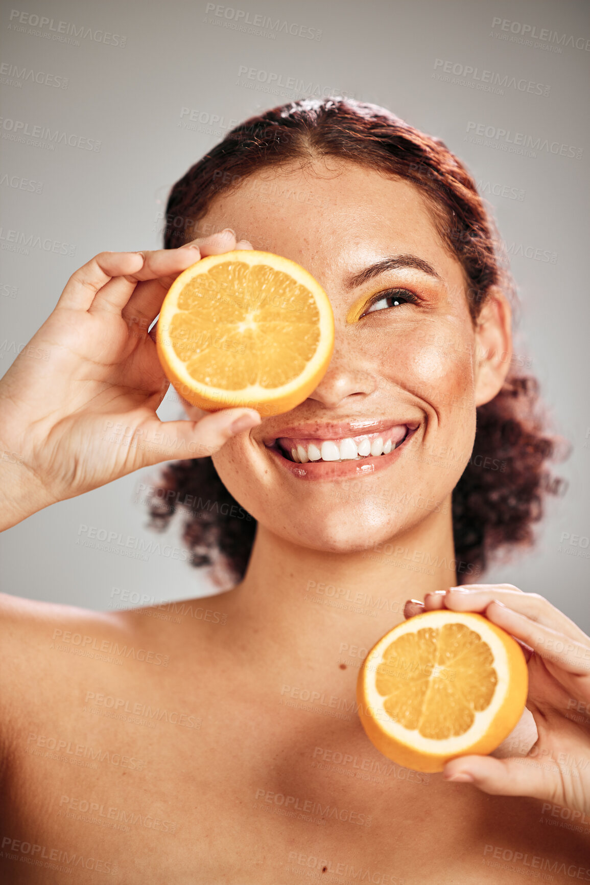 Buy stock photo Orange, beauty and woman face in studio with a smile for natural skin glow, cosmetic and dermatology. Facial results, health and wellness of aesthetic model person happy with vitamin c fruit idea
