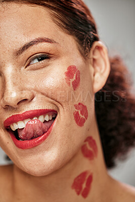 Buy stock photo Beauty woman, lipstick kiss and face of makeup model in studio for cosmetics, love and happiness. Headshot of aesthetic person lick teeth for valentines day spa facial idea or skincare motivation