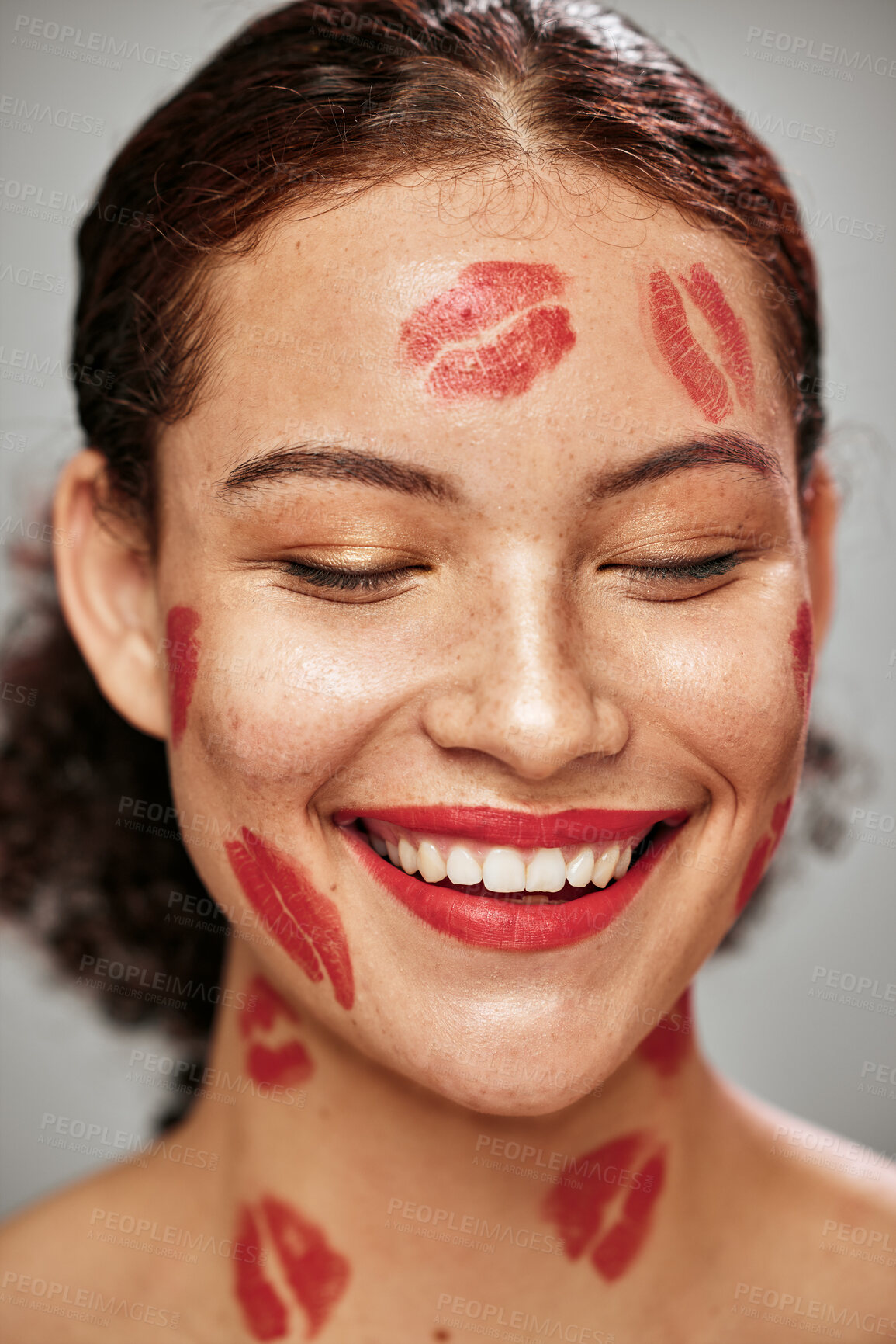 Buy stock photo Happy woman, lipstick kiss and red color makeup on face of model in studio for cosmetics. Headshot of aesthetic person thinking about love for valentines day spa facial idea or skincare motivation