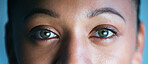 Woman, face and eyes looking for biometrics, optics or vision in the future for scanning identity. Closeup of female eye in focus for scan, cyber security or facial recognition with optical iris