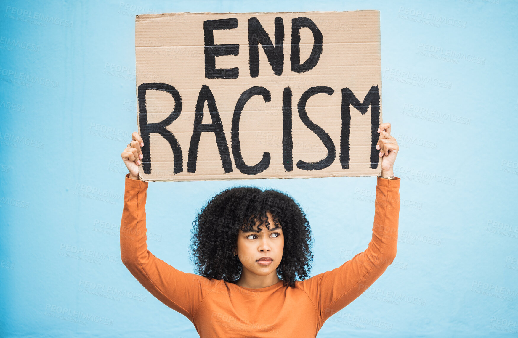 Buy stock photo Black woman protest, sign and angry at racism, fight for equality, human rights and freedom isolated on blue background. Global problem, social justice and revolution, anger in studio and politics