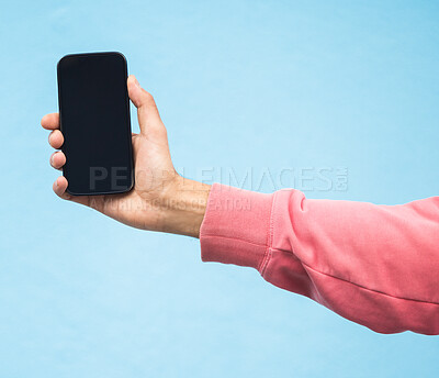 Buy stock photo Man, hand or phone screen mockup on isolated blue background in social media, app or blank web design. Zoom, student or model person with technology mock up for city contact communication or branding