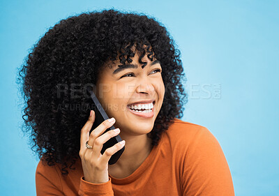 Buy stock photo Laughing black woman, face and phone call by isolated blue background in funny gossip, news and comic story. Smile, afro and happy person talking on mobile communication technology by wall mock up