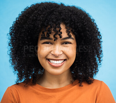 Buy stock photo Happy, black woman or afro hairstyle portrait on isolated blue background in keratin treatment, self love or healthcare wellness. Headshot, smile or beauty model and curly brunette on urban city wall