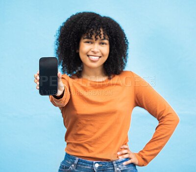 Buy stock photo Black woman, hand or portrait of phone screen mockup on isolated blue background in social media app or web design. Smile, happy person or student on technology mock up, city contact or communication