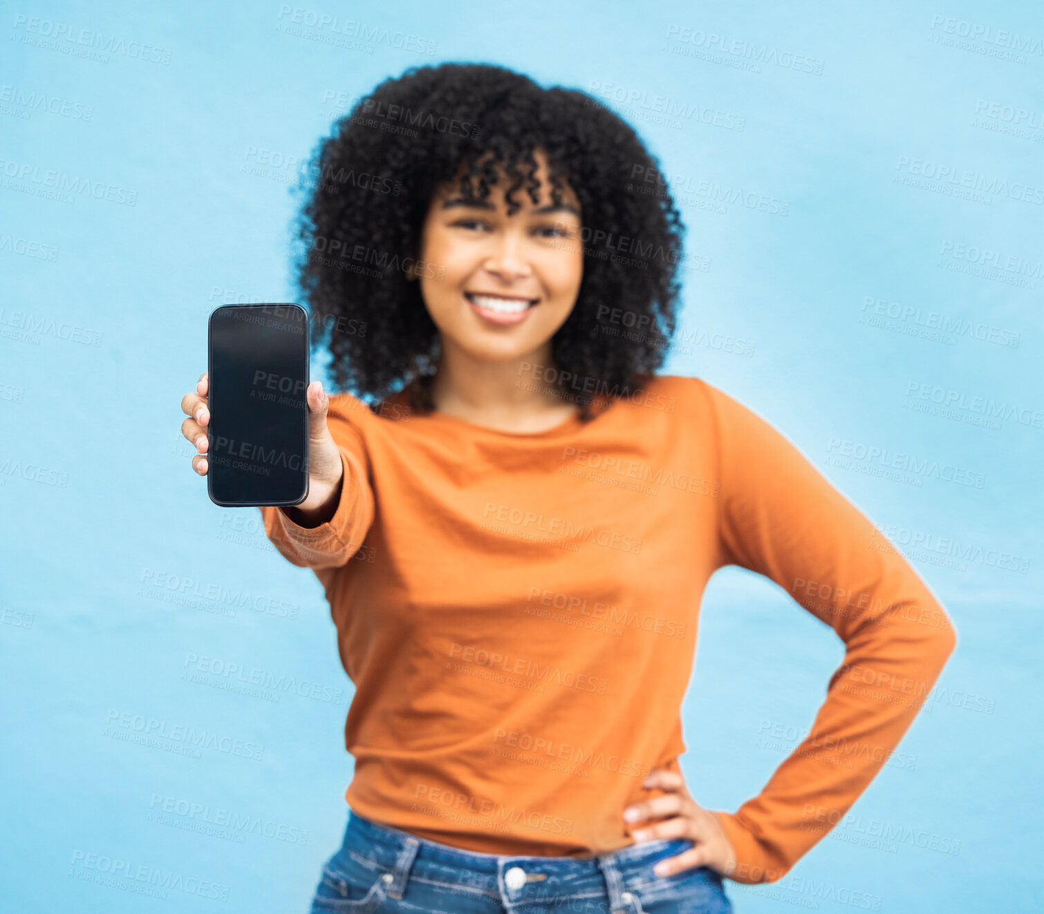 Buy stock photo Black woman, hand or portrait of phone screen mockup on isolated blue background in social media app or web design. Smile, happy person or student on technology mock up, city contact or communication