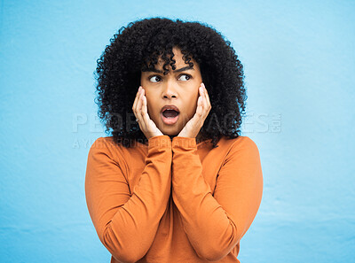 Buy stock photo Wow, surprise and idea with a black woman in shock standing on a blue background in studio. Omg, confused and thinking with an attractive young female looking shocked or surprised indoor