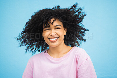 Buy stock photo Shake hair, face portrait and black woman with healthy shampoo hairstyle, studio beauty or luxury facial skincare. Cosmetic makeup, spa salon or afro girl from Brazil isolated on blue background wall