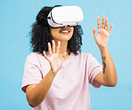 Black woman with virtual reality glasses, happy with hands in metaverse, VR and futuristic tech isolated on blue background. Gaming, web and augmented reality, ux in studio and future technology