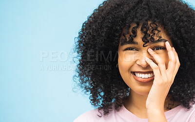 Buy stock photo Smile, hands and portrait of black woman on blue background with makeup, cosmetics and fashion mockup. Beauty, advertising and happy face of girl with copy space for sale, promotion and discount