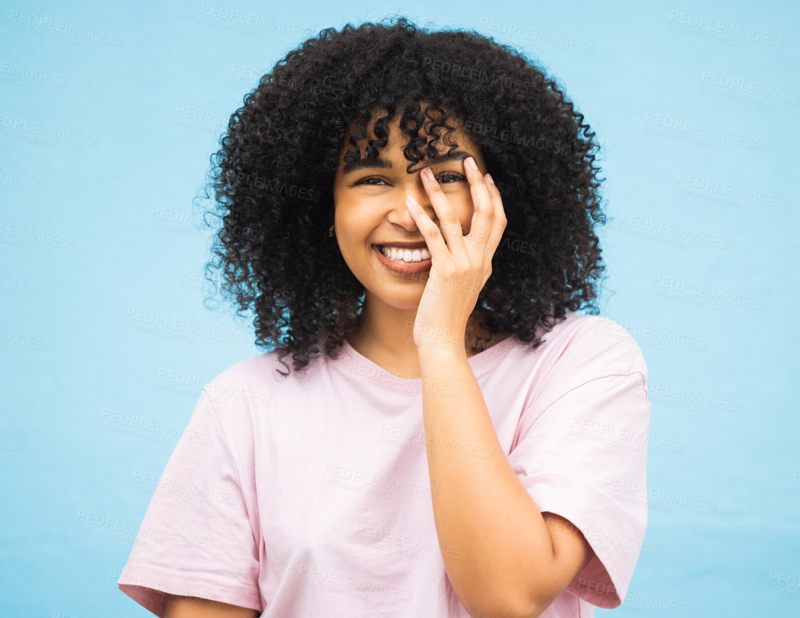 Buy stock photo Hands, smile and portrait of black woman on blue background with makeup, cosmetics and fashion mockup. Beauty, advertising and happy face of girl with copy space for sale, promotion news and discount