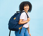Portrait, student and black woman with backpack on blue background for studying. Happy face, girl and young person with bag for university education, scholarship opportunity and learning at college 