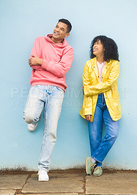 Buy stock photo Black couple, smile and casual fashion standing in urban town wall background for conversation, peace and relax together. Cool man, trendy woman and happy speaking for gen z millennial street style 
