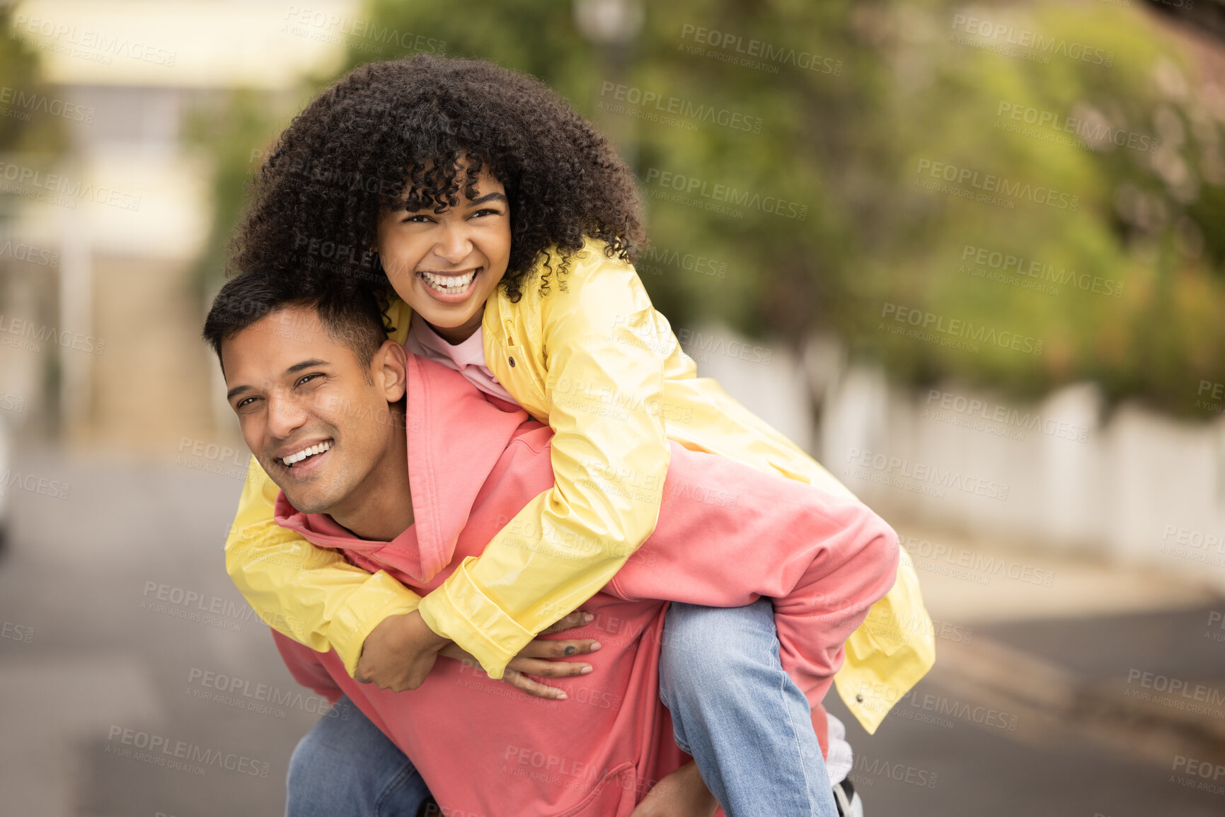 Buy stock photo Black couple, smile and piggyback of young people with love, care and freedom in a street. Urban, happy and free woman and man together with a holiday and happiness hug loving summer fun outdoor