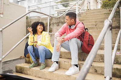 Buy stock photo Student, friends and conversation on stairs talking about social life, class or education at the campus. Young academic university or college students chilling on staircase in funny discussion