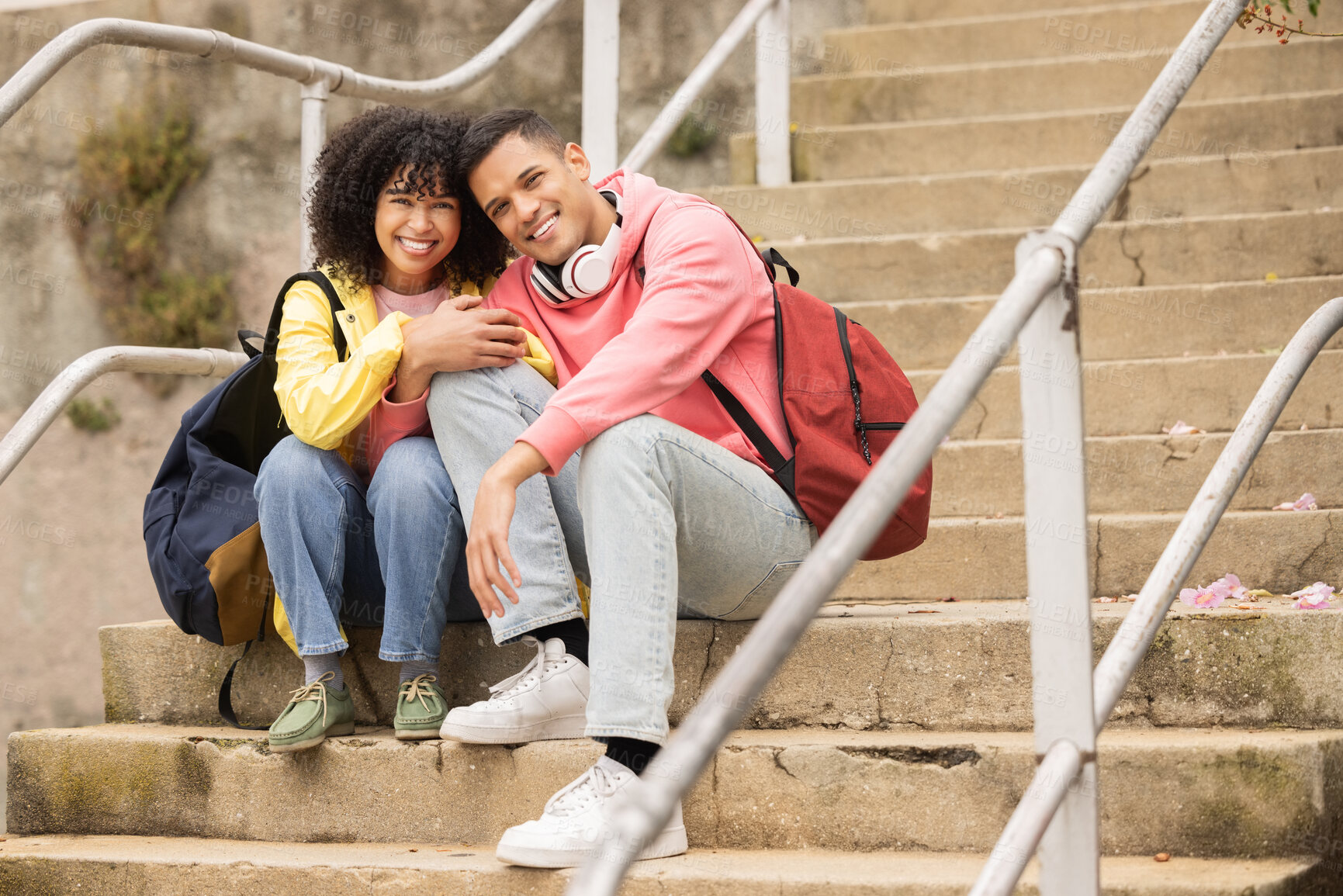 Buy stock photo Portrait, education and stairs with student black couple sitting outdoor together on university campus. Love, learning and college with a man and woman bonding on steps while relaxing outside