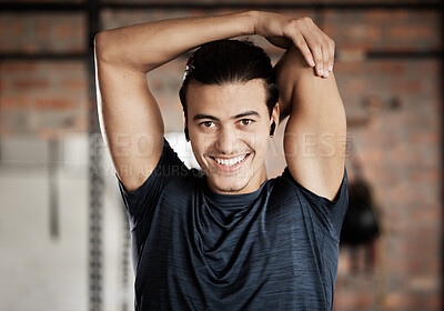 Buy stock photo Arm stretch, gym fitness and portrait of a man ready for exercise, training and wellness workout. Happy, smile and excited young person about to start sport health by stretching for sports alone