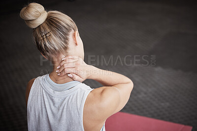 Buy stock photo Neck pain, fitness and woman with injury in a gym after intense physical training or exercise. Medical emergency, sports accident and female athlete with sore, ache and swollen muscle in sport center