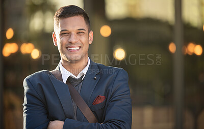 Buy stock photo Young businessman, happy and portrait in urban city standing crossed arms for success, positive mindset and happiness. Corporate man, smile and confident face for business achievement in cityscape