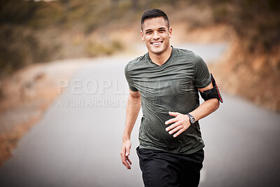 Running, fitness and man in road portrait for exercise, training and workout with lose weight, muscle and energy. Happy runner, athlete or healthy person jogging for sports challenge in nature street
