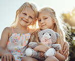 Children, smile and teddy outdoor portrait with happiness, smile and bonding together. Freedom, happiness and smiling of a young girl with friend love and care in a park or garden feeling free