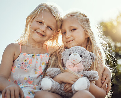 Buy stock photo Children, smile and teddy outdoor portrait with happiness, smile and bonding together. Freedom, happiness and smiling of a young girl with friend love and care in a park or garden feeling free