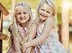 Happy, girl smile and teddy outdoor portrait with happiness, smile and bonding together. Freedom, children and smiling of young kids with friend love and care in a park or garden feeling free