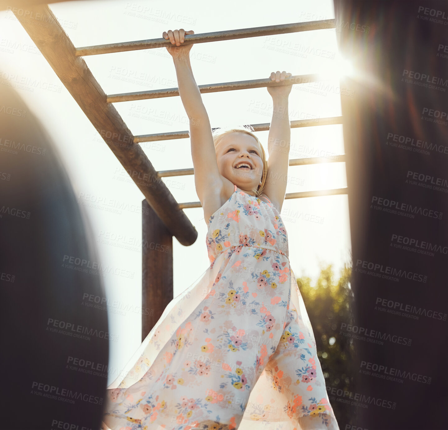 Buy stock photo Child, happy or playing on monkey bars in park, nature garden or house backyard on holiday vacation or summer break. Jungle gym, exercise or fun hanging game for smile, kid or girl in energy climbing