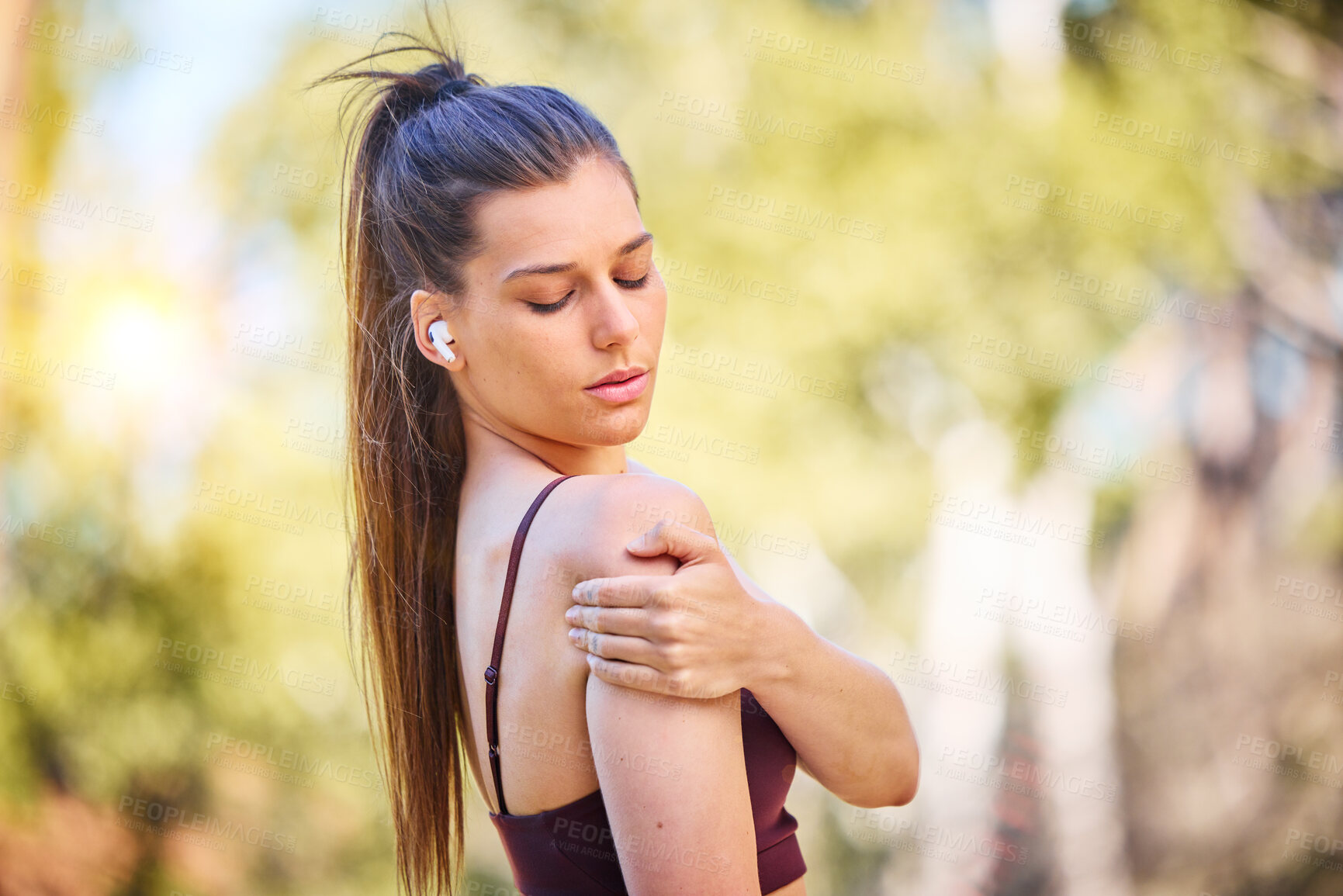 Buy stock photo Woman runner, nature and shoulder pain on park path for fitness, health or rest by trees to massage. Outdoor training, running and relax in woods for muscle pain emergency, anatomy problem or workout