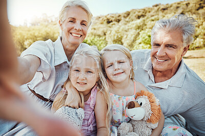 Buy stock photo Love, selfie and grandparents with girls in park, smile or loving together for vacation, break or bonding. Portrait, granny or grandfather with granddaughters outdoor, playful or happiness on holiday