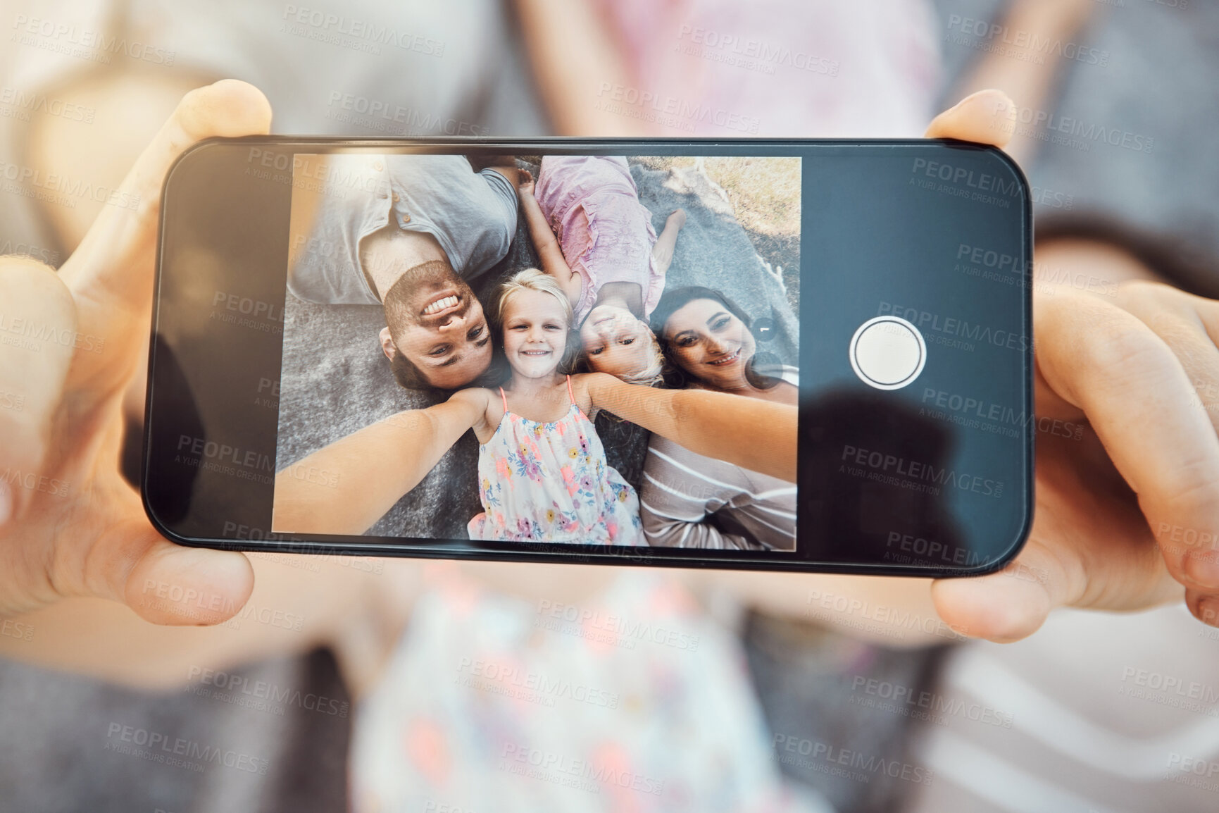 Buy stock photo Phone screen, hands and family selfie portrait of hand with mobile zoom and smile on ground. Children, parents and happy together with love and care using a cellphone photo with kids on holiday 