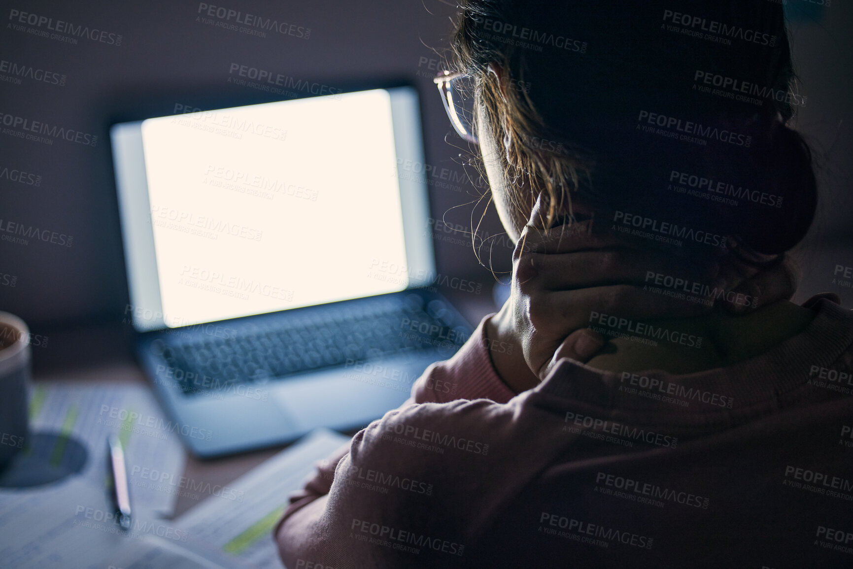 Buy stock photo Mockup, screen and student tired at night, focus and notes for test, studying and education. Woman, female and academic with laptop light, pain in neck and revision in the evening, dark and computer