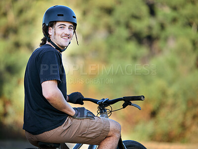 Buy stock photo Portrait, bicycle and fitness with a sports man taking a break outdoor in nature during his trail ride. Bike, exercise and workout with a male athlete training outside for cardio or endurance