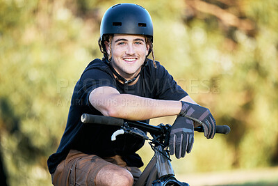 Buy stock photo Portrait, bike and fitness with a sports man taking a break outdoor in nature during his trail ride. Bicycle, exercise and workout with a male athlete training outside for cardio or endurance