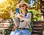 Woman, backpack or phone for travel vlog, video call or live streaming in nature sightseeing, park adventure or forest woods. Smile, happy or waving tourist on mobile technology for social media blog