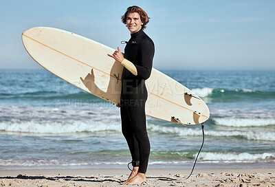 Buy stock photo Man, surfer and surfboard at the beach for training exercise or fitness workout in the outdoors. Portrait of happy sports professional with smile showing hand gesture for hang loose ready for surfing