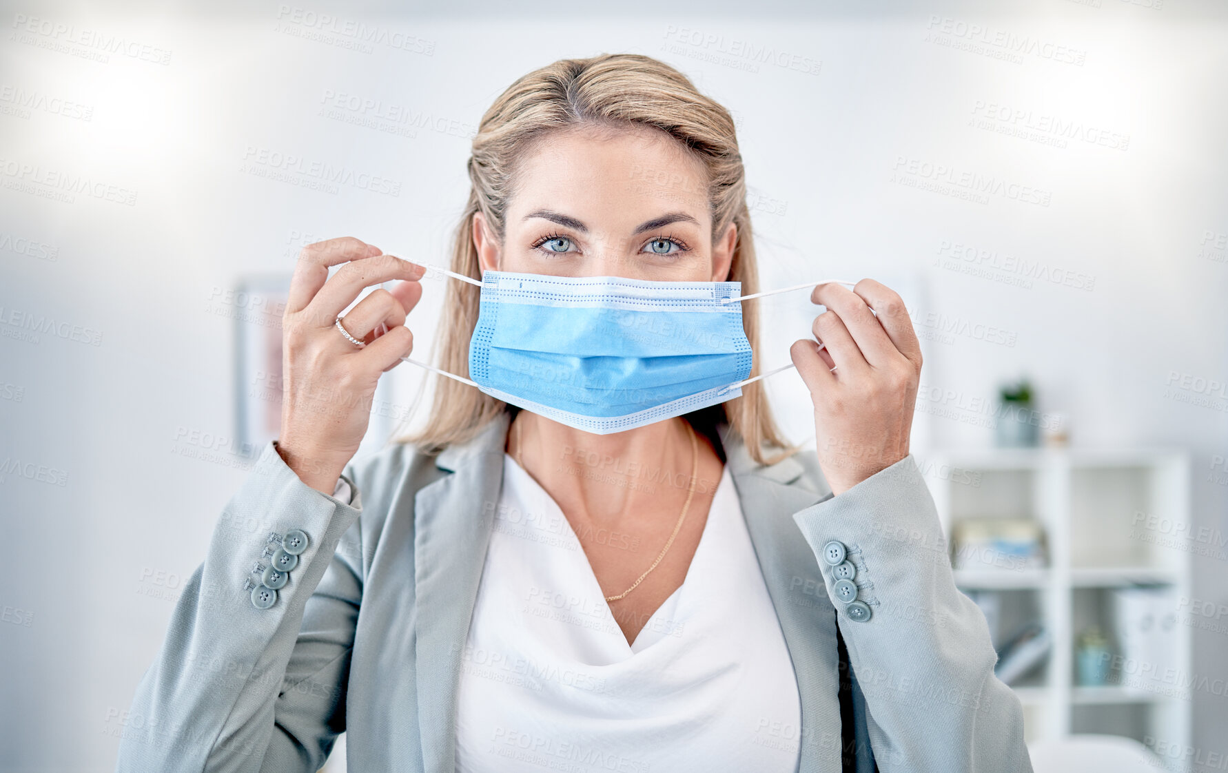 Buy stock photo Woman, office portrait and put on mask for covid 19 safety, health and stop spread in workplace. Corporate leader, manager and wellness in workspace with blurred background, ppe and self care at job