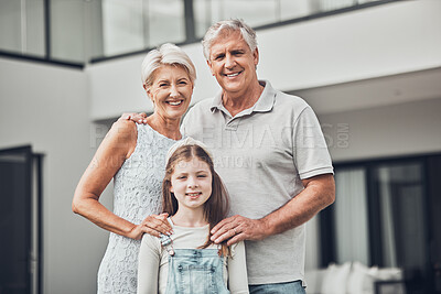 Buy stock photo Real estate, family home and portrait of girl with grandparents in new house, apartment and residence. Retirement, smile and child, grandfather and grandmother for moving, property and building sale