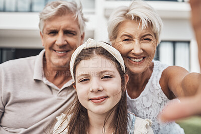 Buy stock photo Portrait, grandparents and child love taking a selfie as a happy family in summer holidays in a backyard. Elderly, relax or girl smiles in a picture while bonding with grandmother and old man at home
