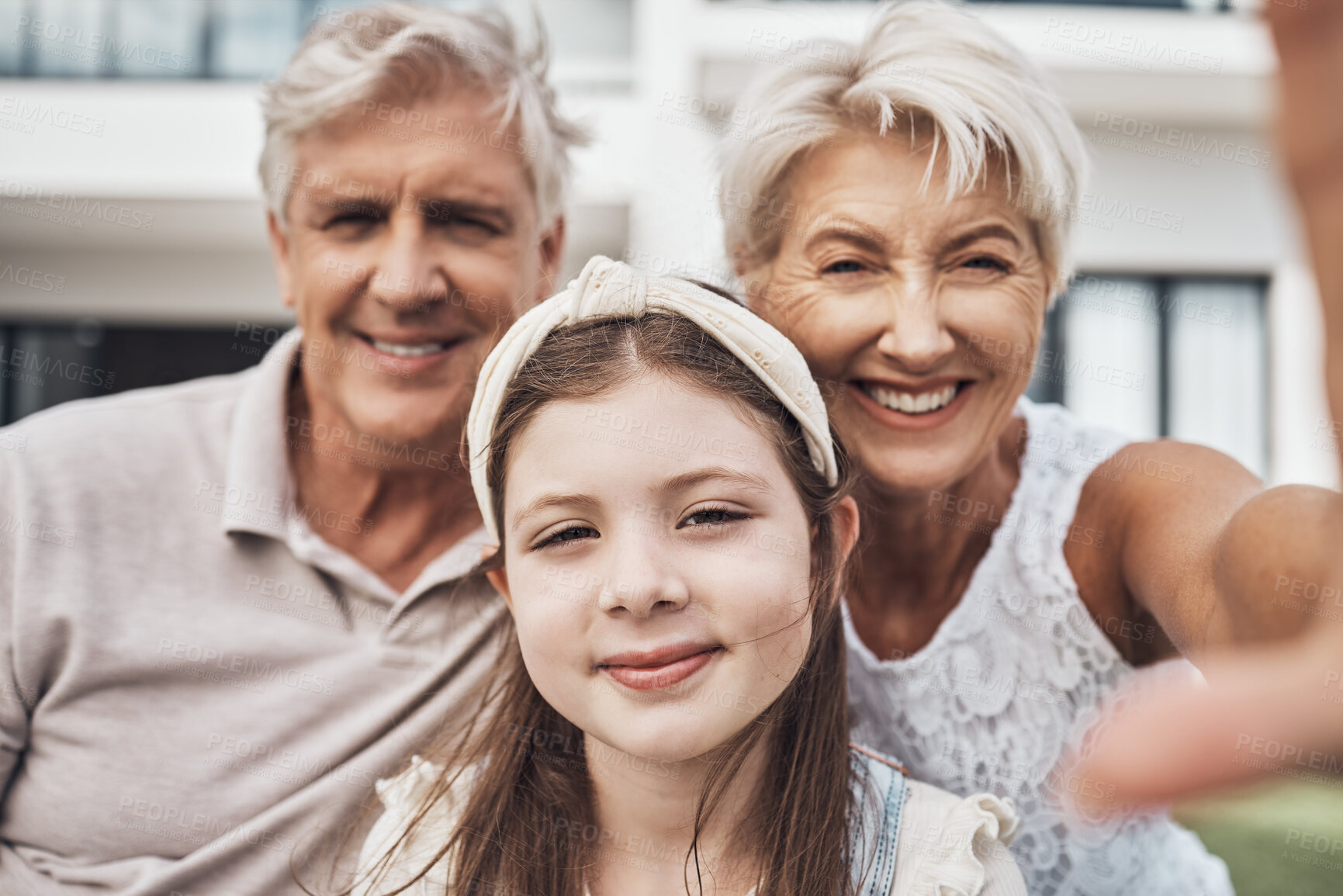Buy stock photo Portrait, grandparents and child love taking a selfie as a happy family in summer holidays in a backyard. Elderly, relax or girl smiles in a picture while bonding with grandmother and old man at home