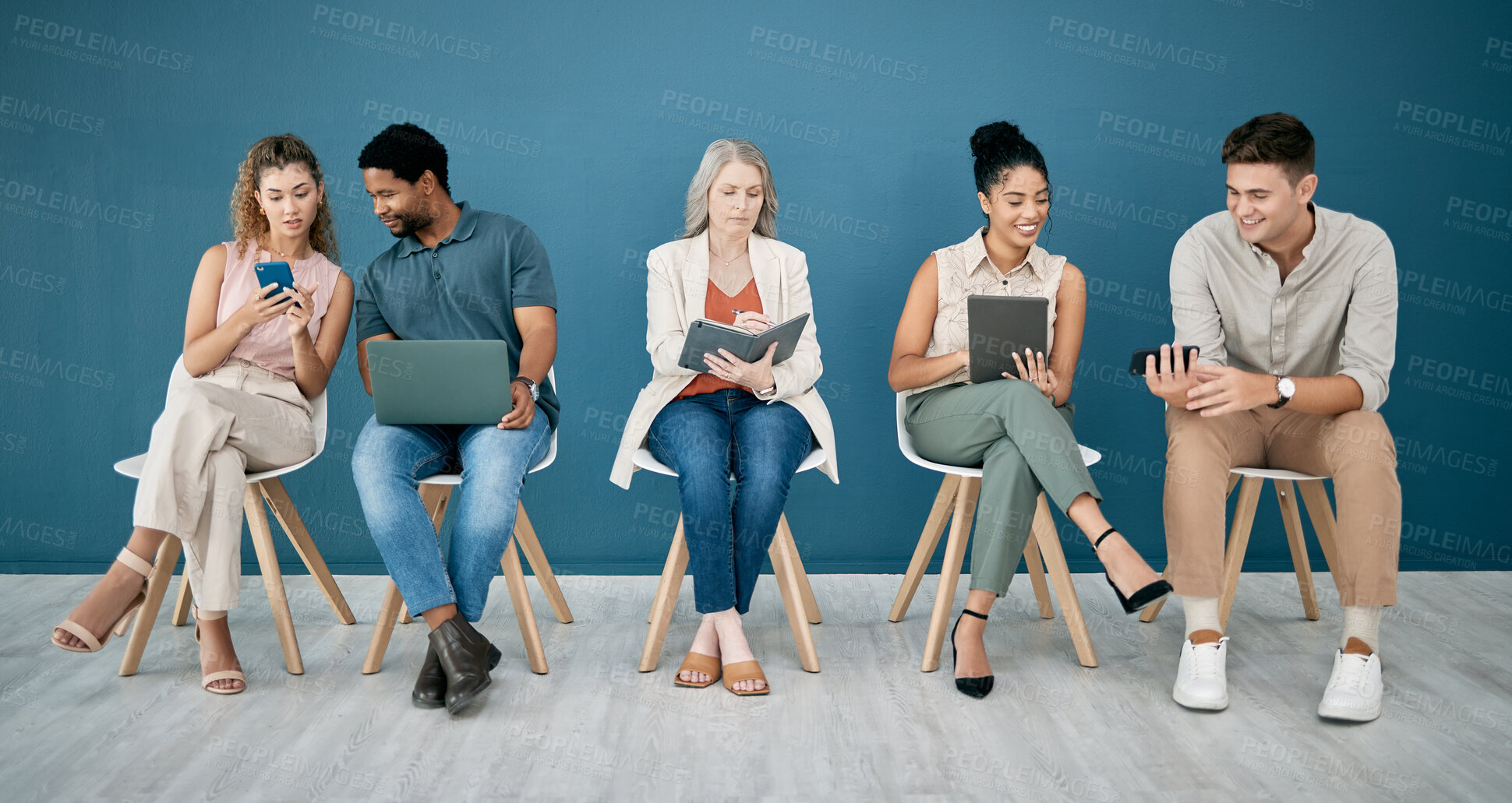 Buy stock photo Human resources, hr and people in a waiting room for job interview at office. Onboarding, hiring or group of business men and women with book and technology, wait and sitting in a row for recruitment