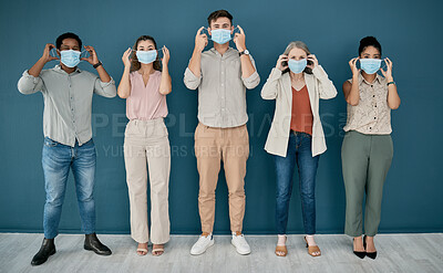 Buy stock photo Covid, portrait and group of business people in office for health and safety. Teamwork, compliance and employees, men and women with face mask or ppe to stop corona virus for wellness in workplace.