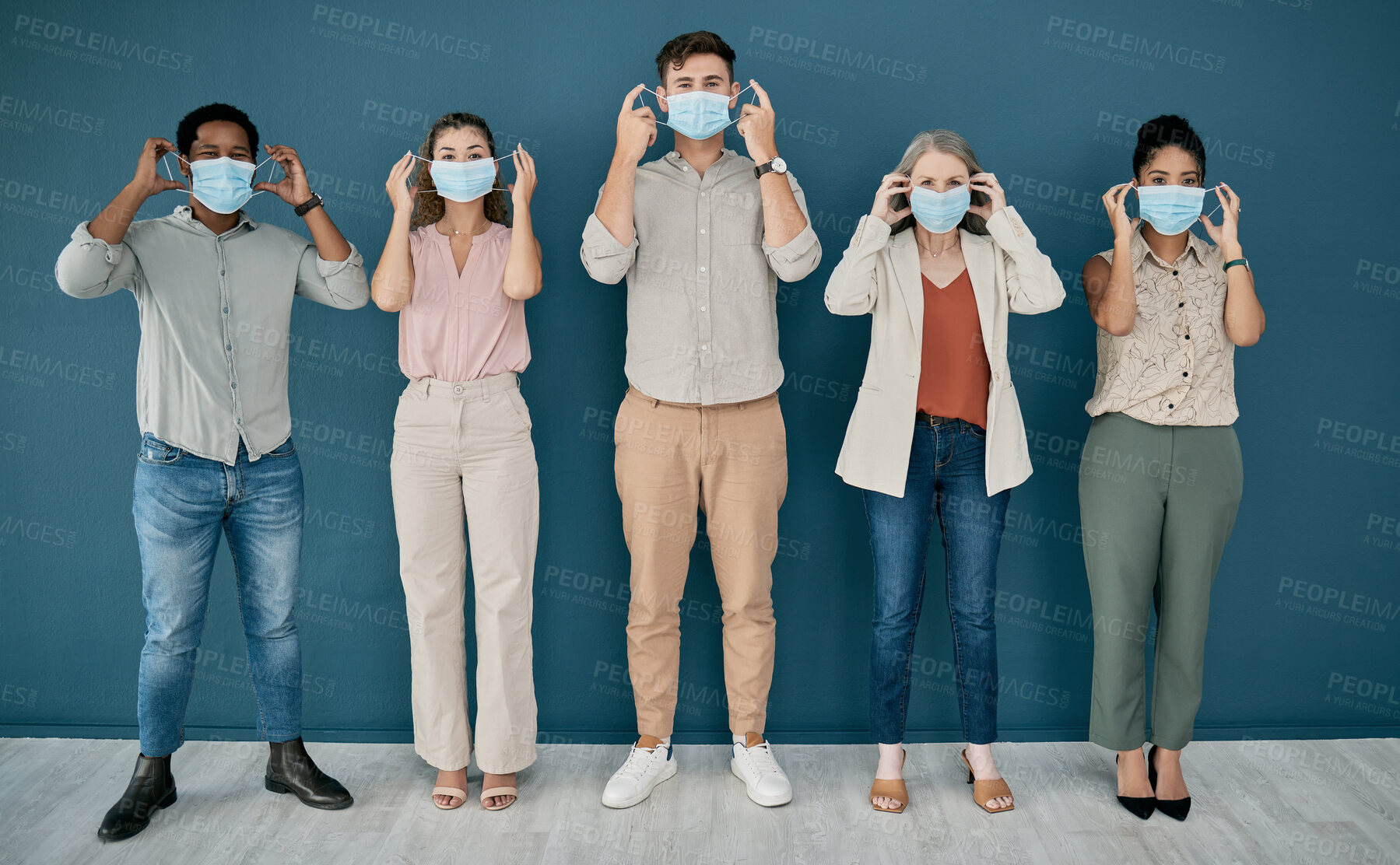 Buy stock photo Covid, portrait and group of business people in office for health and safety. Teamwork, compliance and employees, men and women with face mask or ppe to stop corona virus for wellness in workplace.