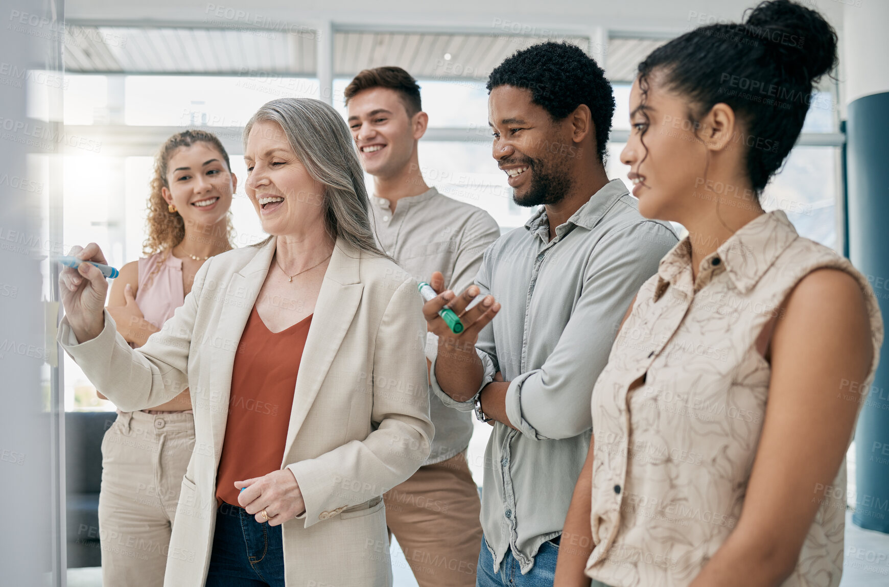 Buy stock photo Meeting, collaboration and planning with a woman manager training or coaching her team in the office. Leadership, management and whiteboard with a senior female writing during a learning workshop