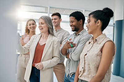 Buy stock photo Meeting, teamwork and planning with a woman manager training or coaching her team in the office. Leadership, management and whiteboard with a senior female writing during a learning workshop