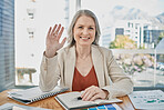 Video call, senior and business woman wave in office, conference or meeting. Greeting, hello and portrait of elderly female worker from Canada waving in webinar, workshop or online chat in workplace.