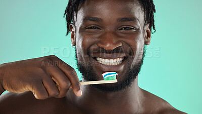 Buy stock photo Black man, face and toothbrush, happy portrait with smile for teeth whitening and cleaning mouth isolated on studio background. Fresh breath, beauty and hygiene with toothpaste, health and dental 