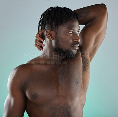 Buy stock photo Beauty, health and man with armpit skincare hygiene or grooming isolated against a studio background. Natural, cosmetics and body care for healthy skin by a young, confident and African model
