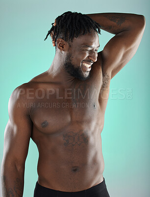 Buy stock photo Armpit, bicep and happy man with skincare hygiene or grooming isolated against a studio background. Natural, cosmetics and body care for healthy skin by a young, confident and African model
